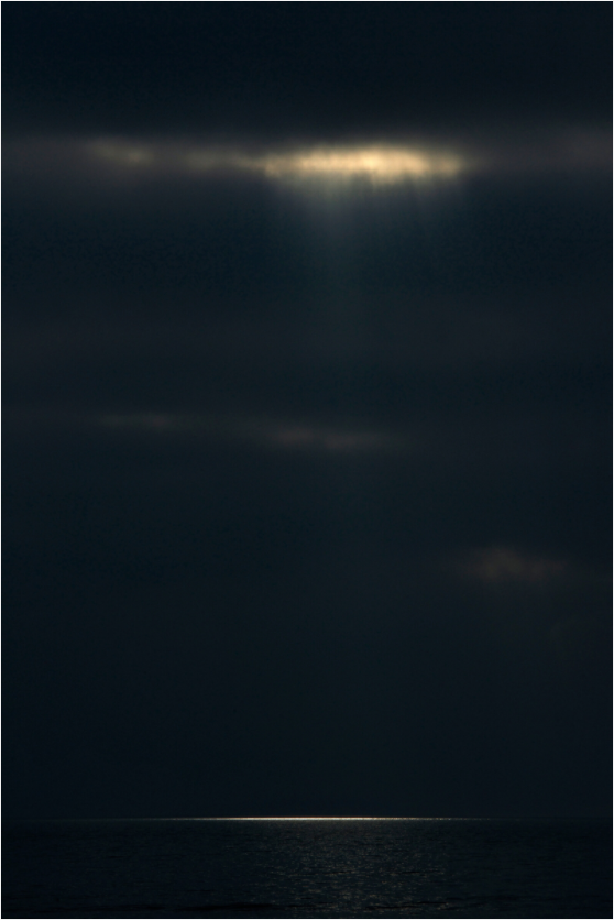 Main image A Fleeting Moment on a Dark Ocean